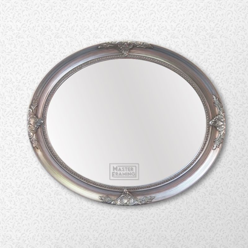 Ornate oval silver framed mirror 289S